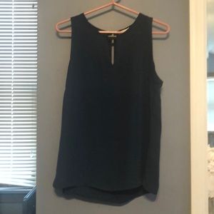 Sleeveless silky blouse with front detail